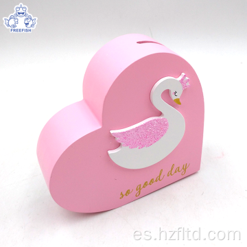 Hucha de madera con forma de corazón cisne blanco